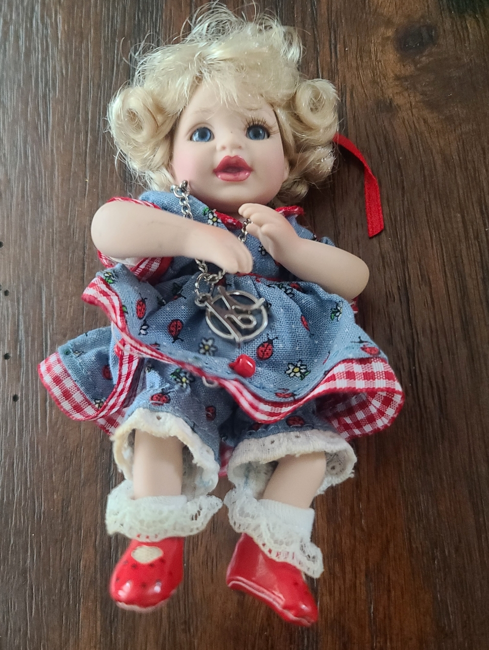 Marie Osmond Tiny Doll With Charm Necklace And Ladybug Dress, Porcelain